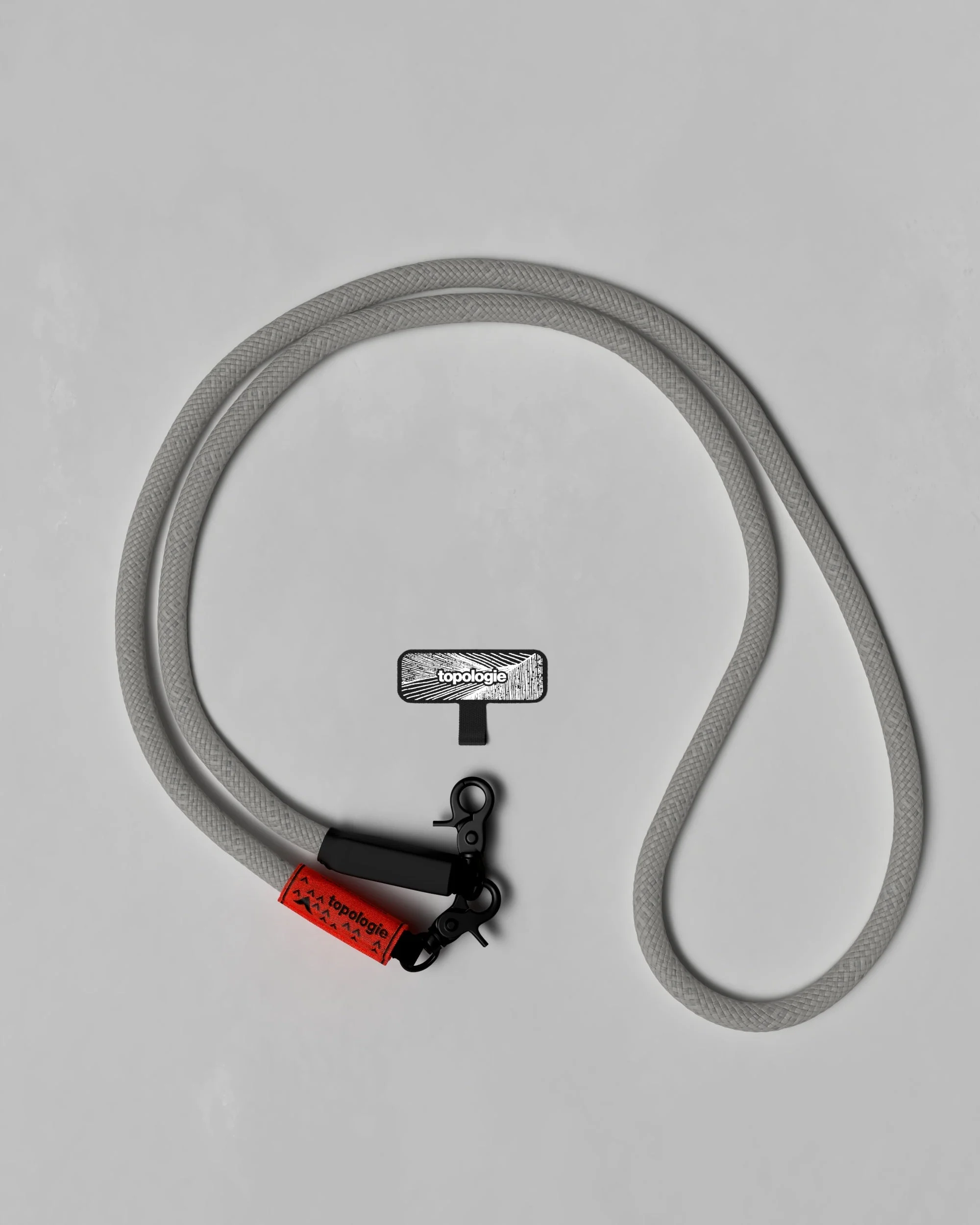 1134-phone-strap-adapter-10mm-rope-grey-reflective-1.webp Phone Strap Adapter / 10mm Rope / Grey Reflective