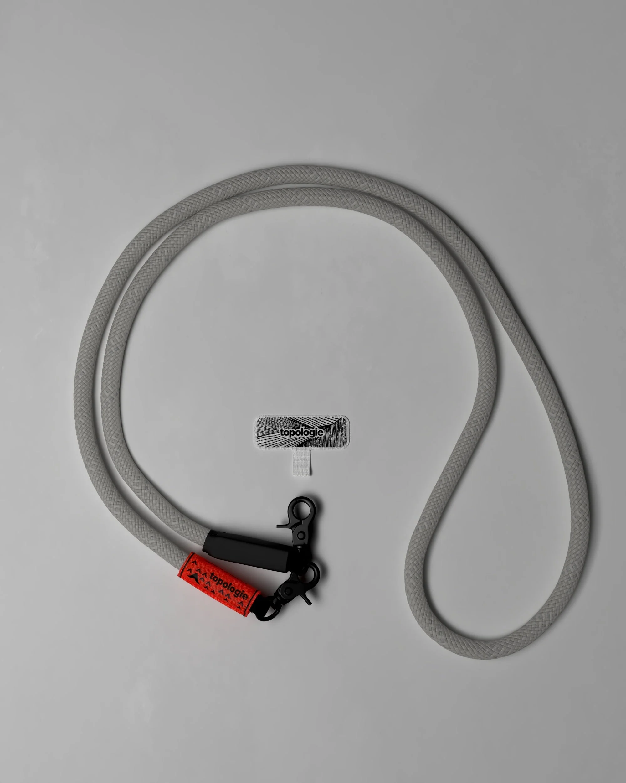 1134-phone-strap-adapter-10mm-rope-grey-reflective-2.webp Phone Strap Adapter / 10mm Rope / Grey Reflective